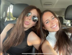 two young women smiling in a selfie